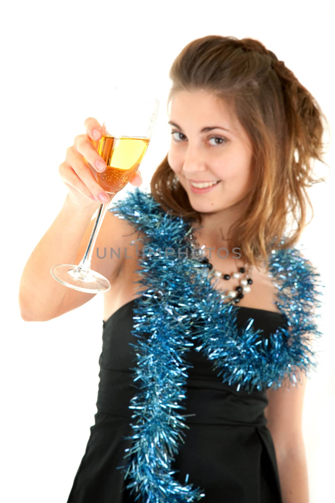 Beautiful woman with a glass with champagne on white background. Focus on the glass.