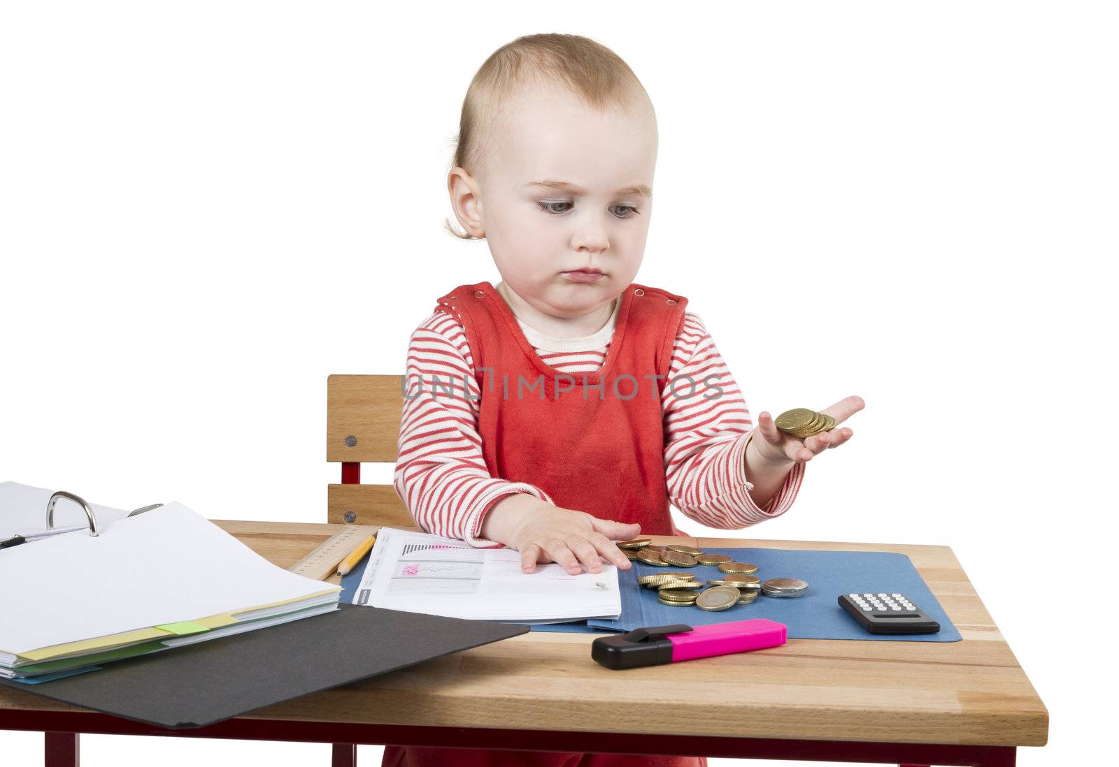 young child working at writing desk in light background