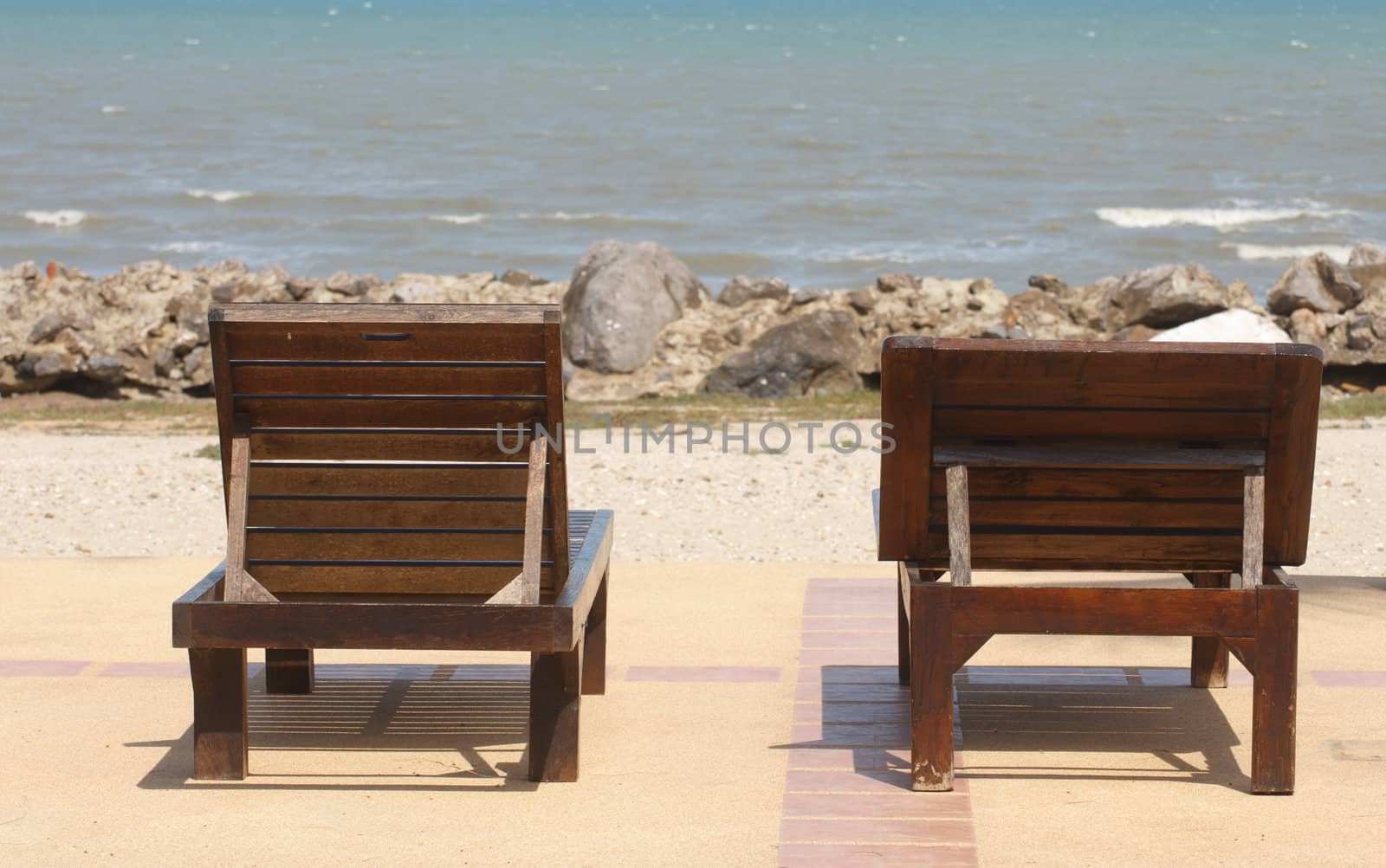 Chair made from wood by the sea