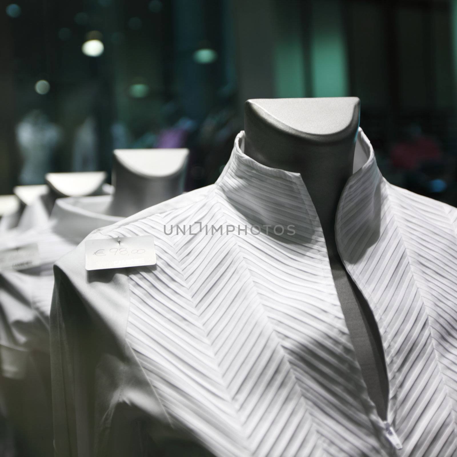 showcase with white clothes