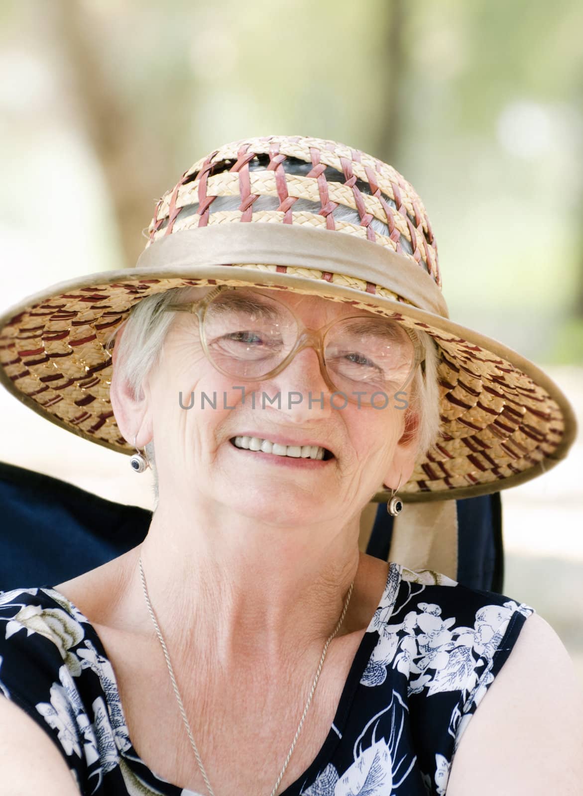 Smiling senior woman loking at camera