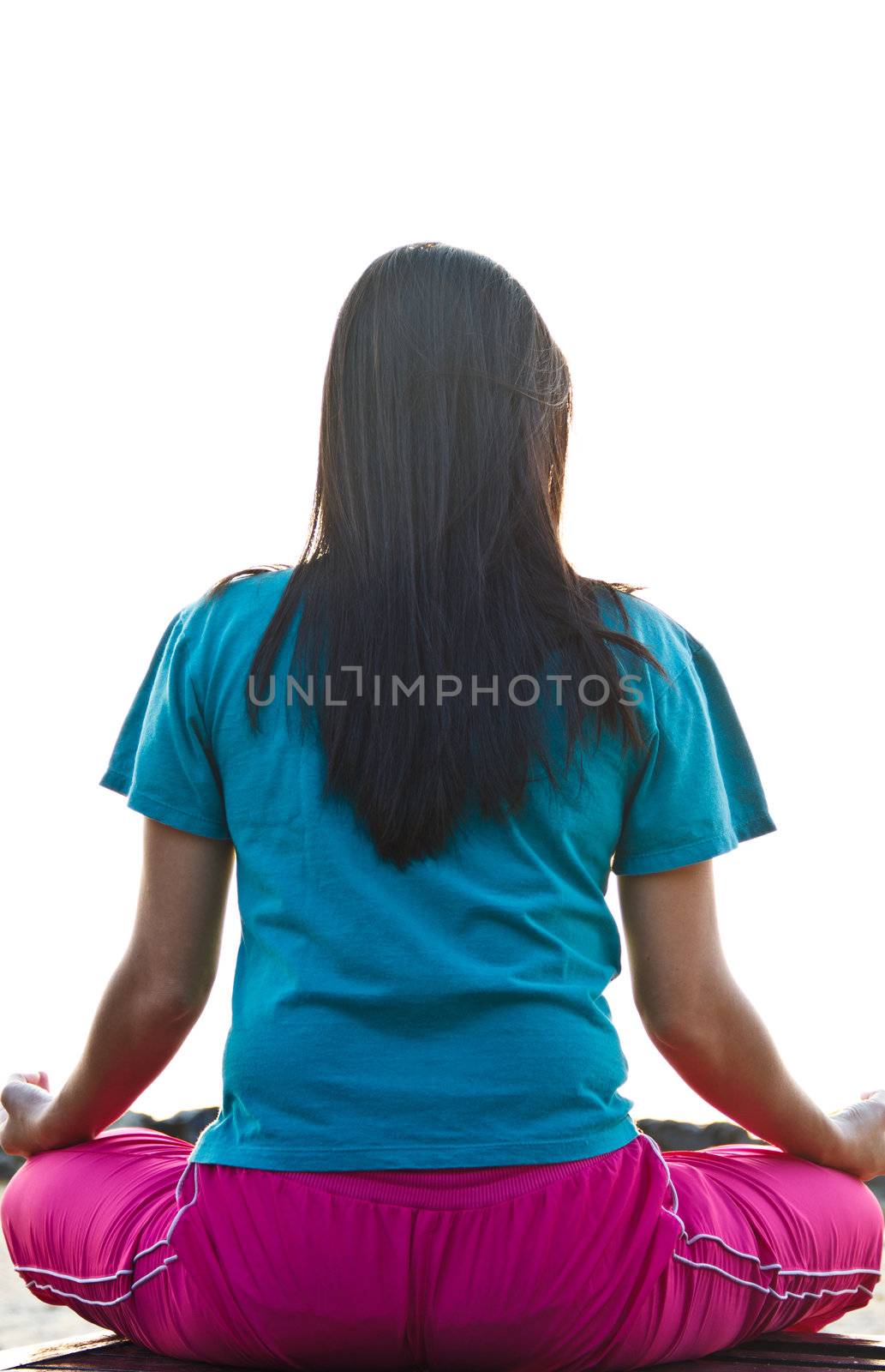 Young woman sitting alone