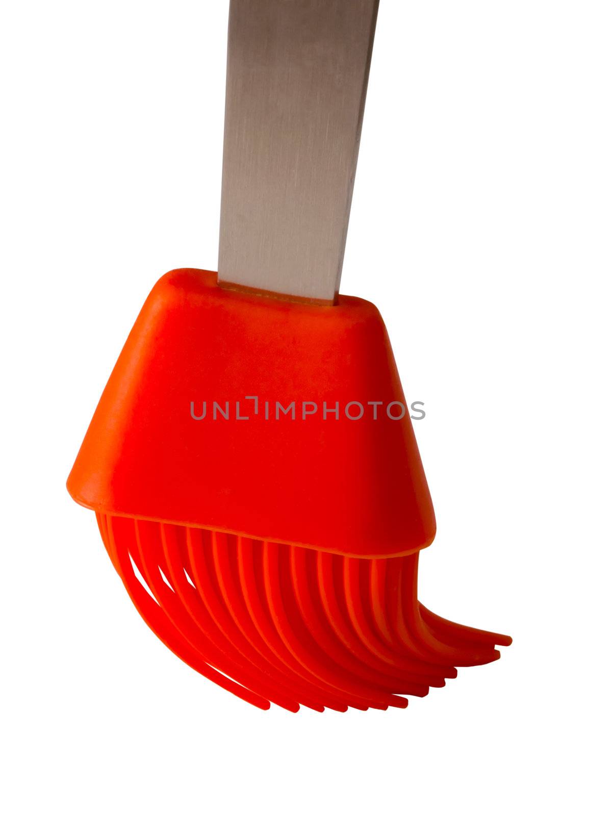 close up of a red silicone pastry brush