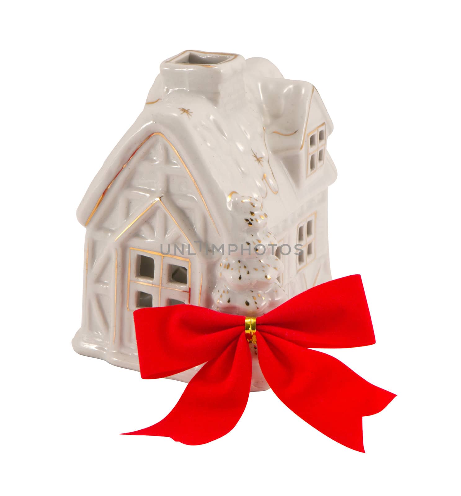 Small white house and red band ribbon. Christmas present. by sauletas