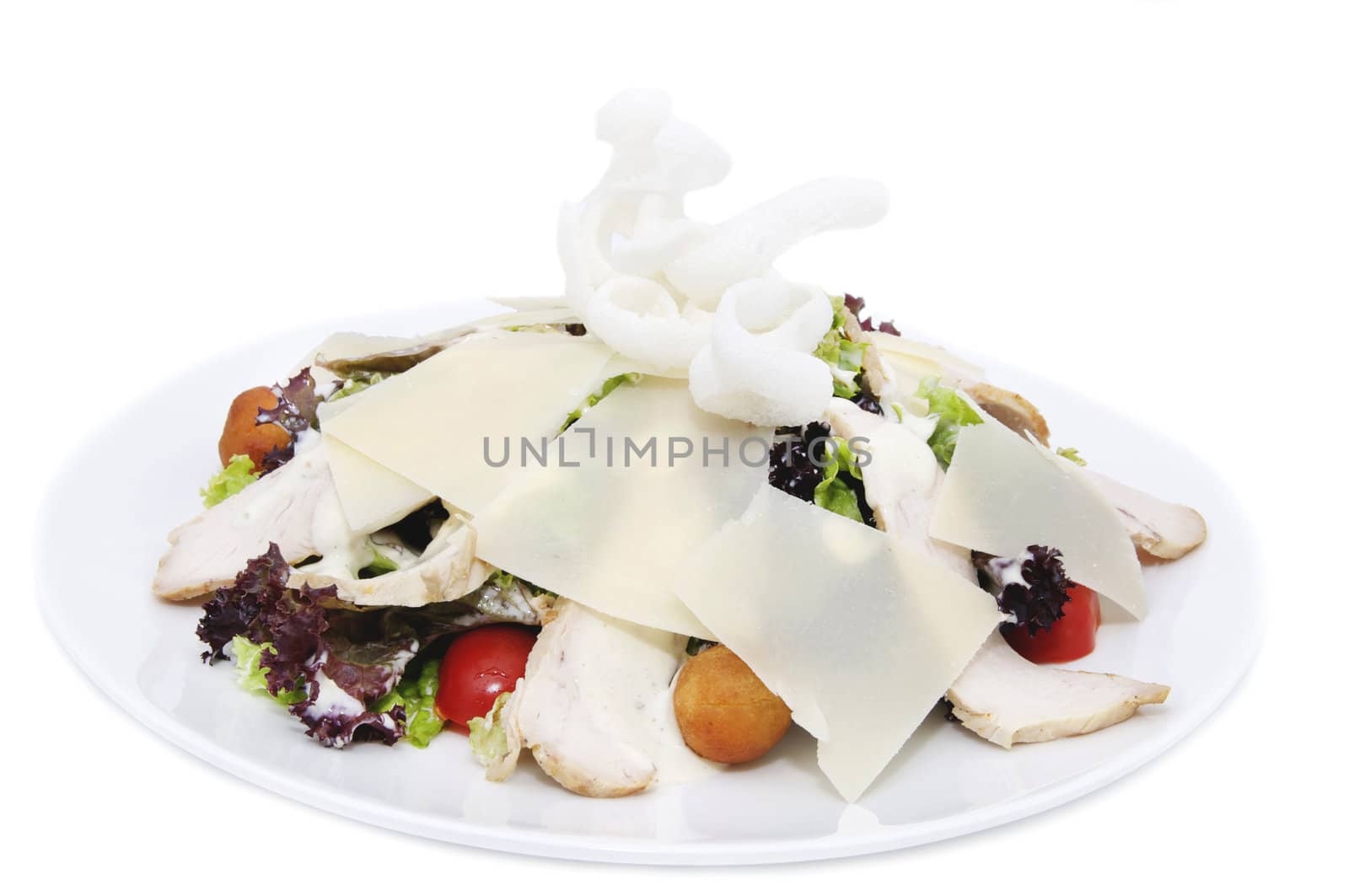 salad with vegetables, meat and cheese on white background