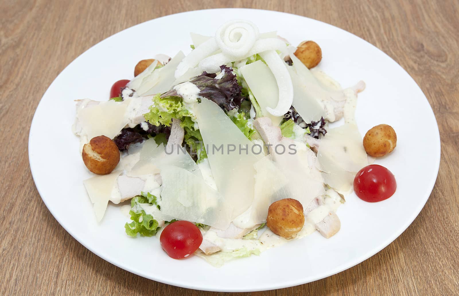 salad with vegetables, meat and cheese