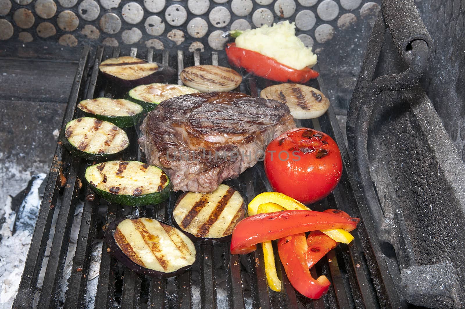 Grilled vegetables are cooking with fire