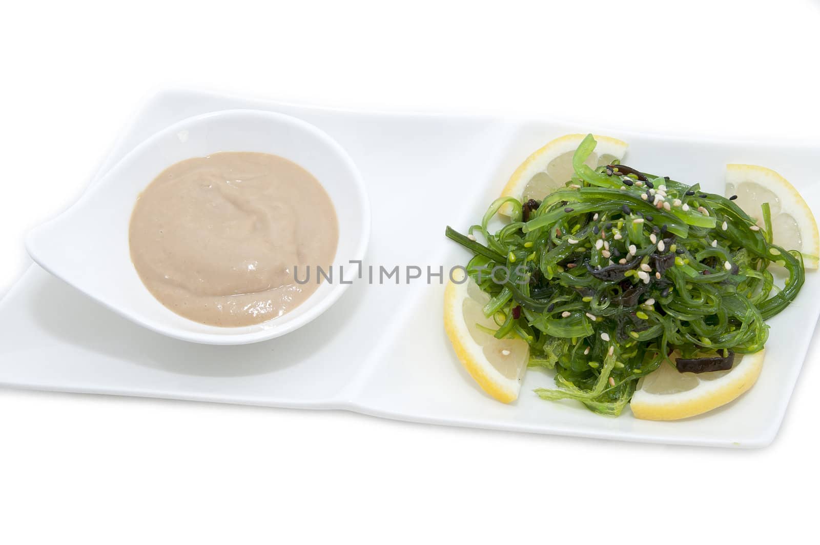 salad with exotic marine algae on a white background