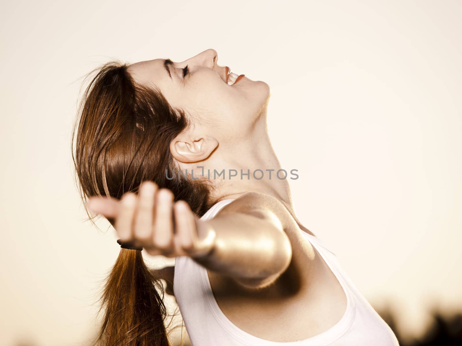 Outdoor portrait of a woman on a meadow releaxing