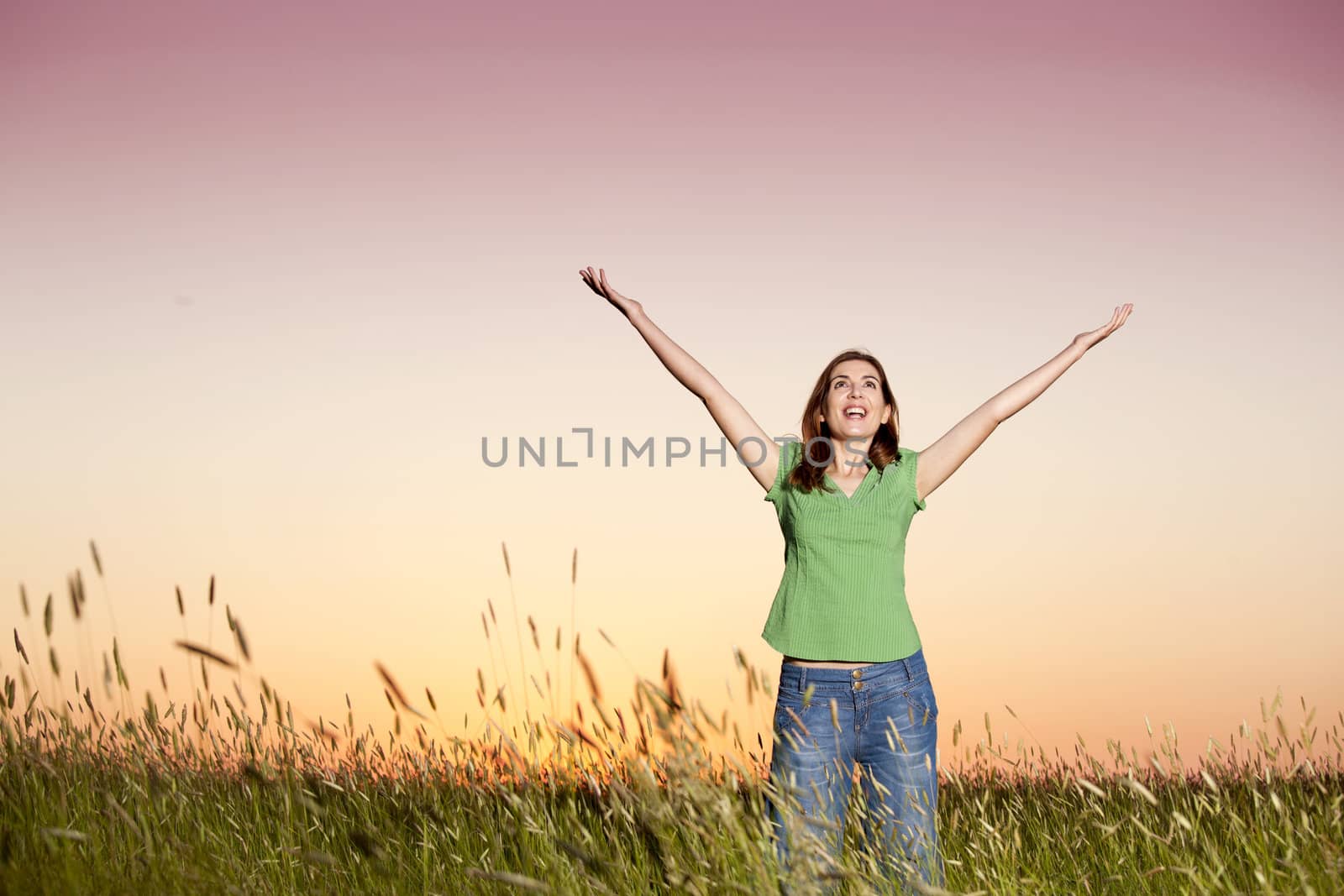 Outdoor portrait of a woman on a meadow releaxing