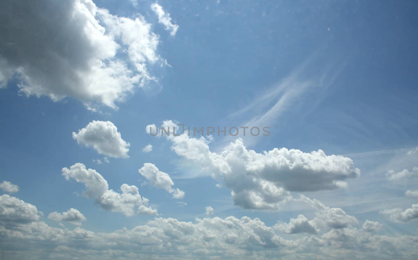 white clouds on blue sky