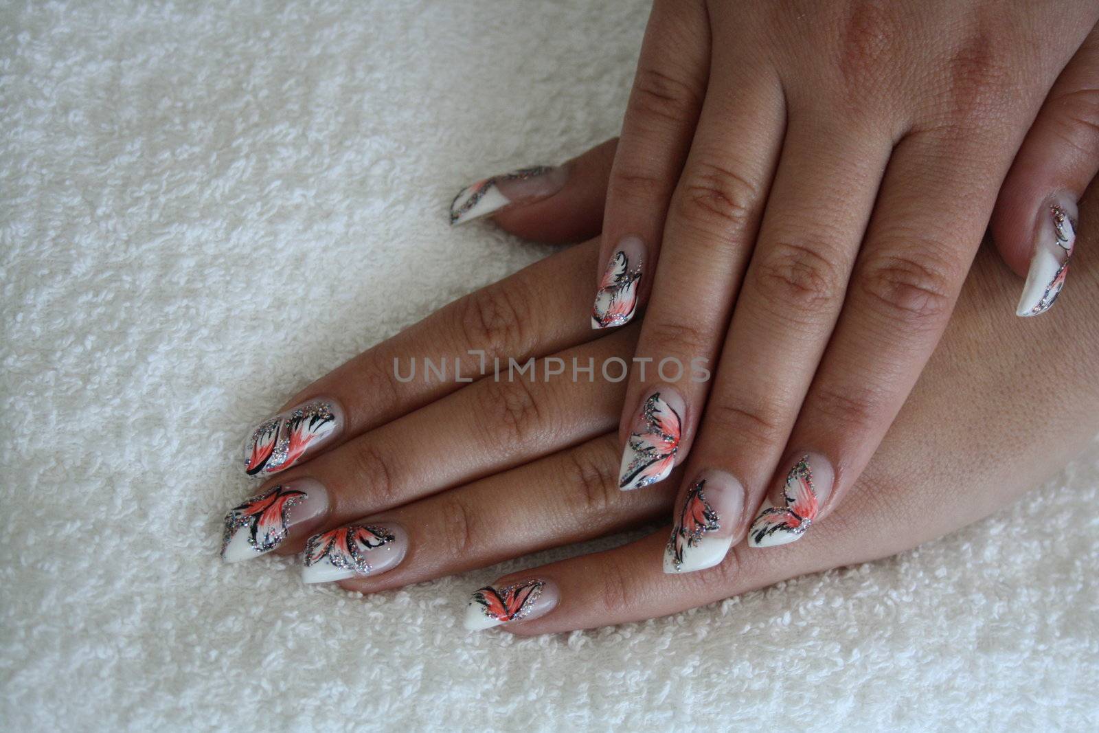 beautiful girl hands with manicure by photochecker