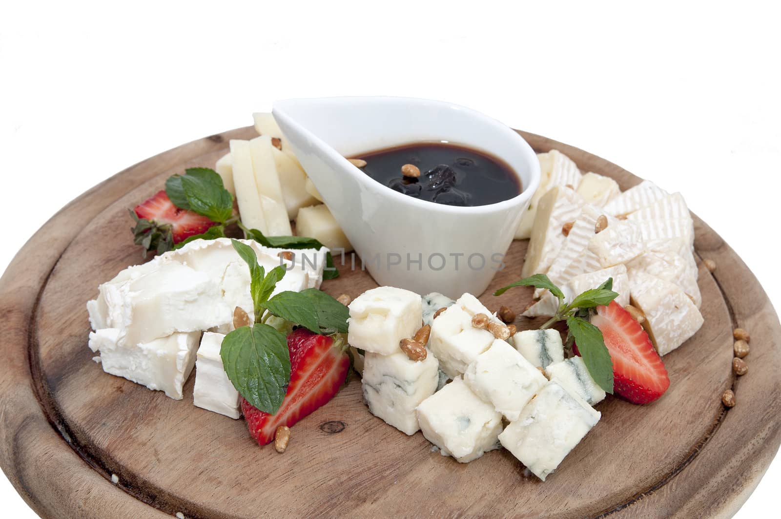 cheese plate with a large decorated the assortment of mint