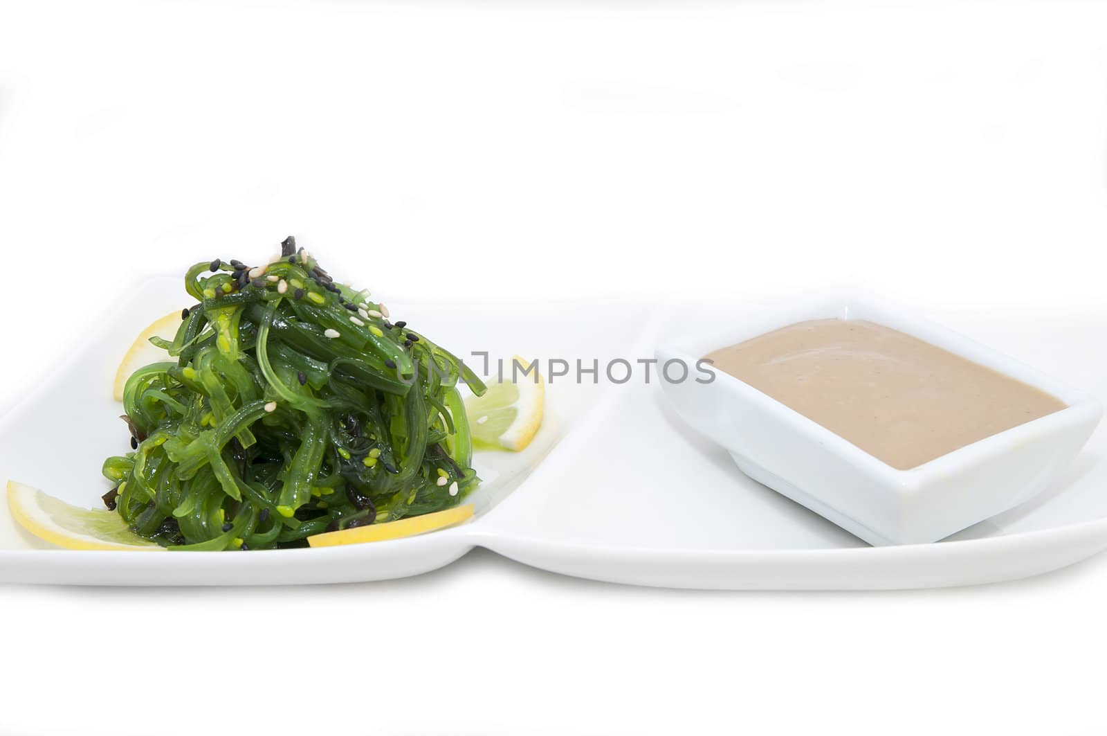 salad with exotic marine algae on a white background