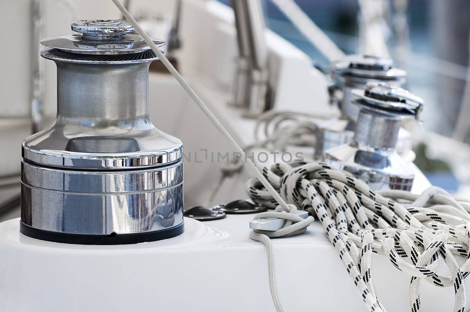 Winches and ropes on a sailboat deck