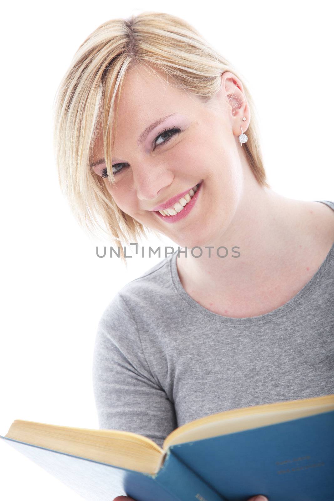 Attractive blonde woman with a book isolated on white 