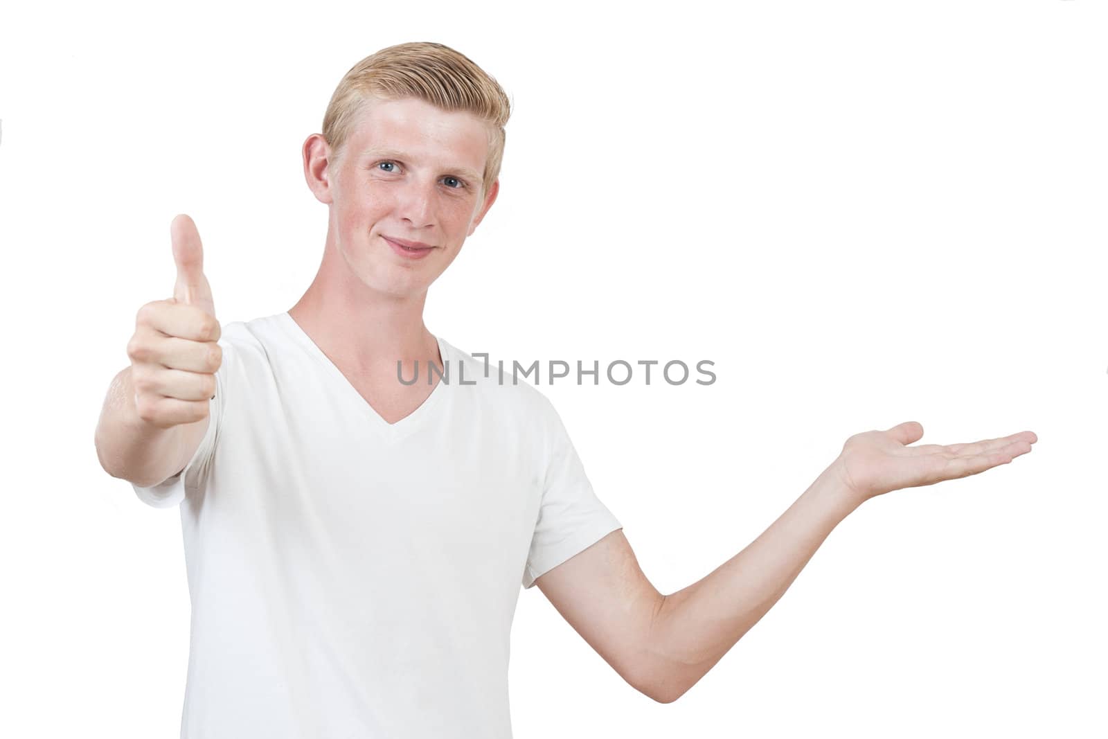 Portrait of a handsome young man thumbs up and present something against white background
