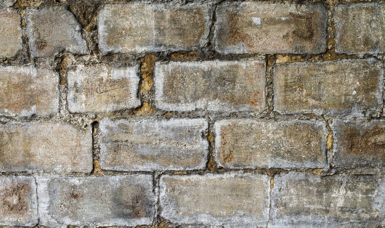 Old damaged brick wall close up. High resolution texture