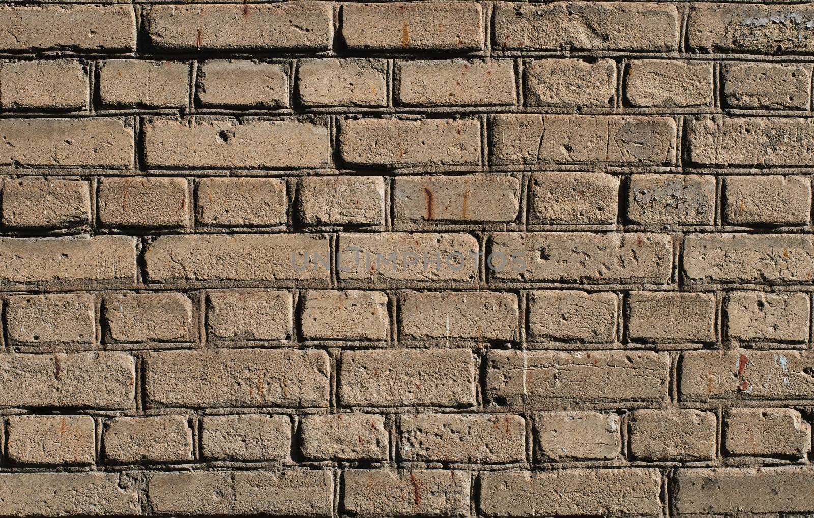 Aged brick wall background. High resolution texture