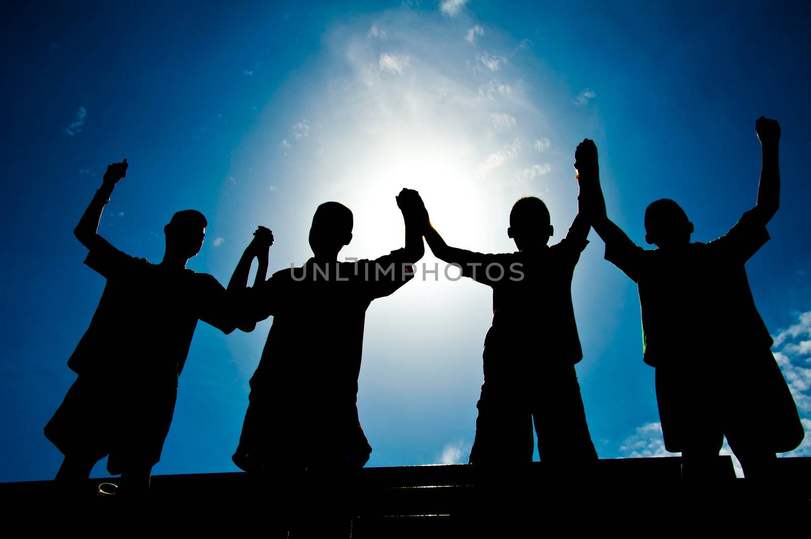 silhouette of boy with medal prize