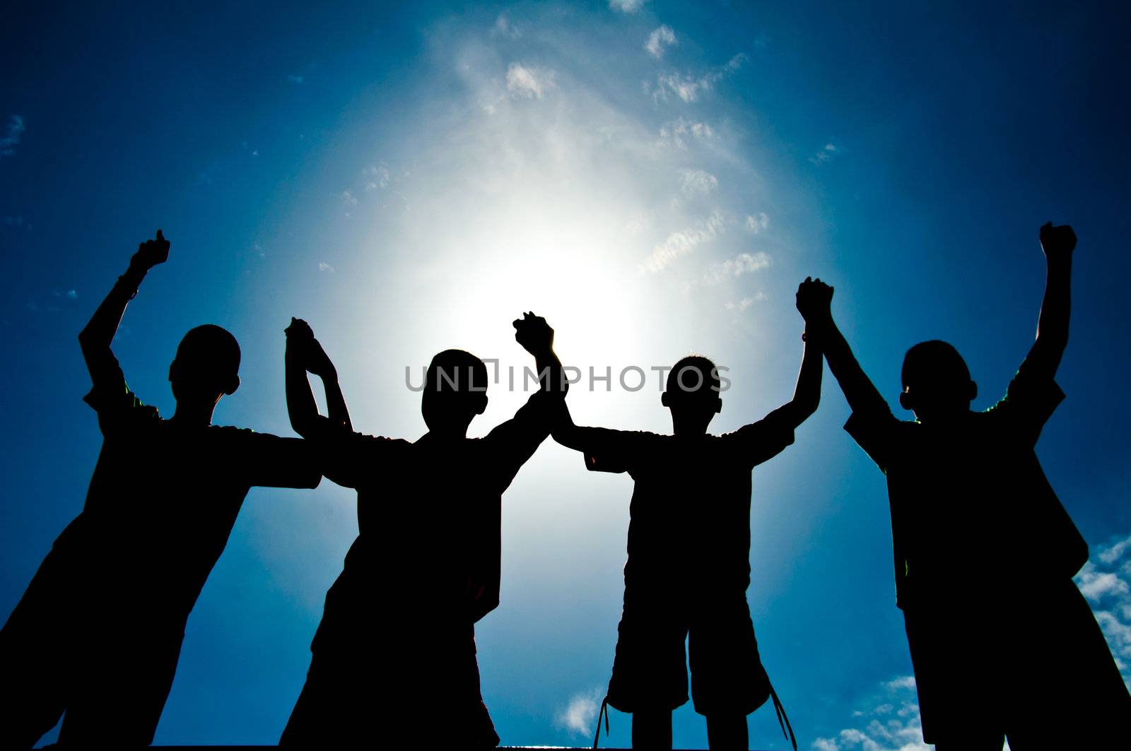 silhouette of boy with medal prize