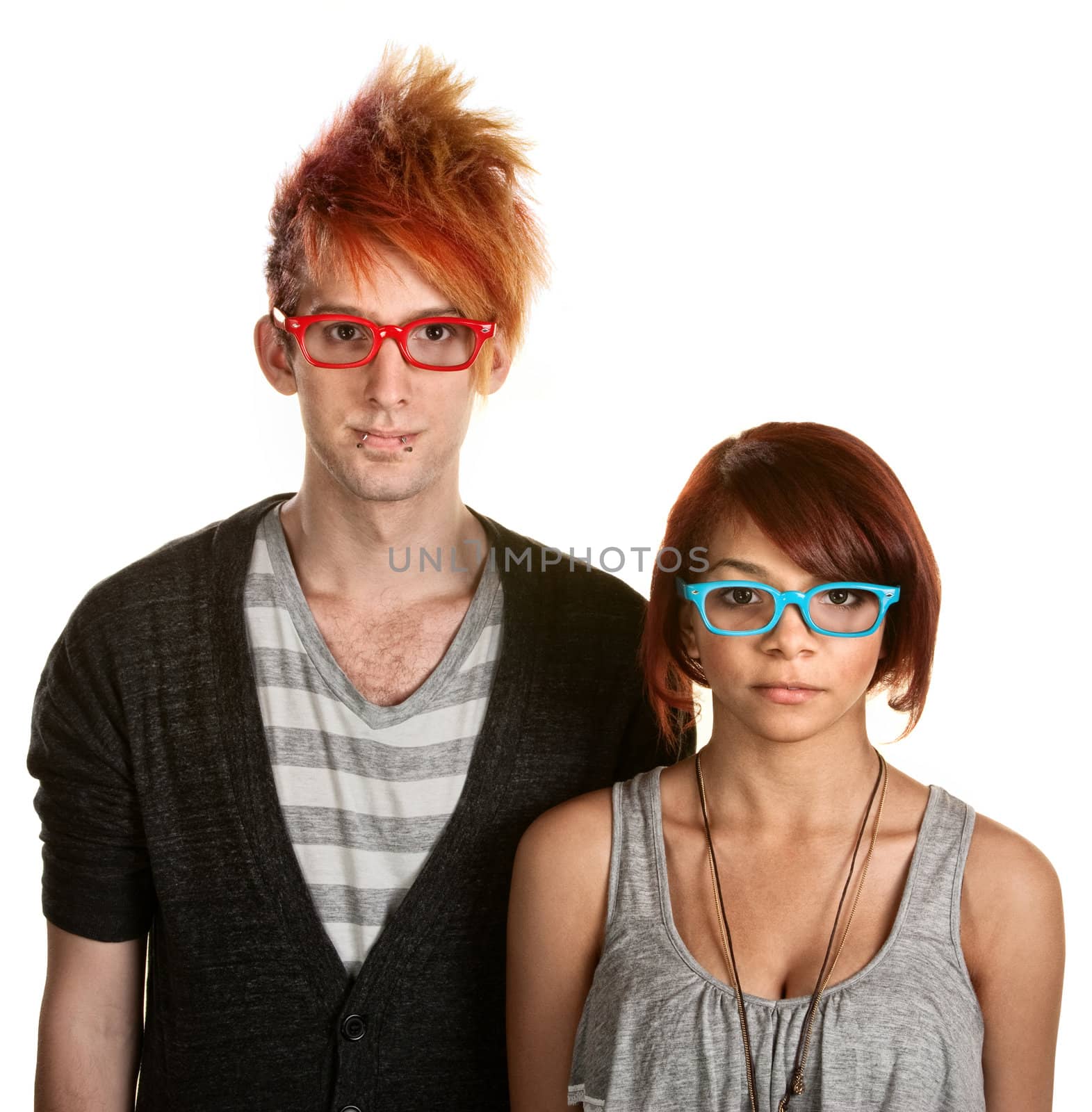 Cute teen couple with red and blue eyeglasses