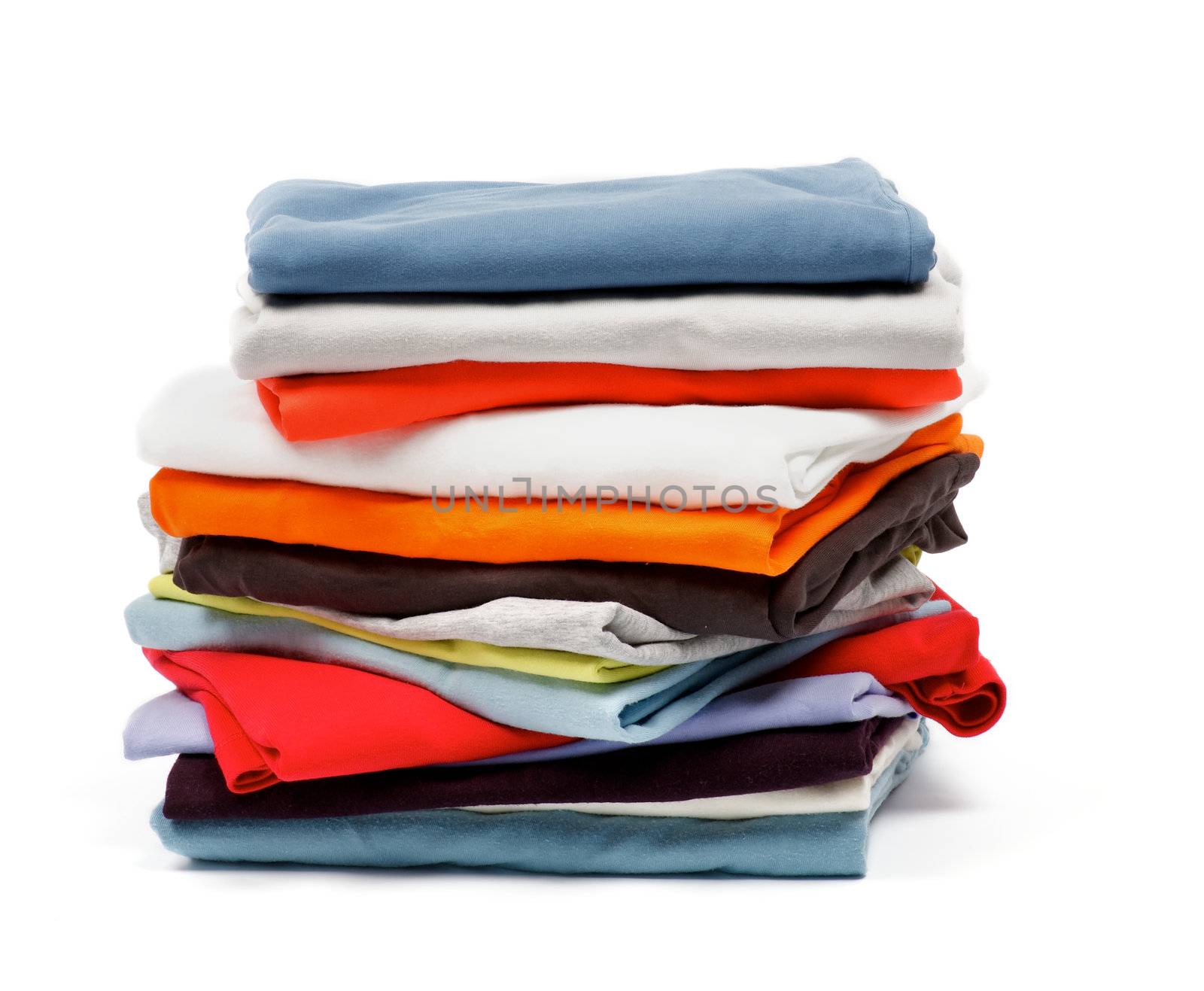 Stack of Color T-Shirts and Clothes isolated on white background