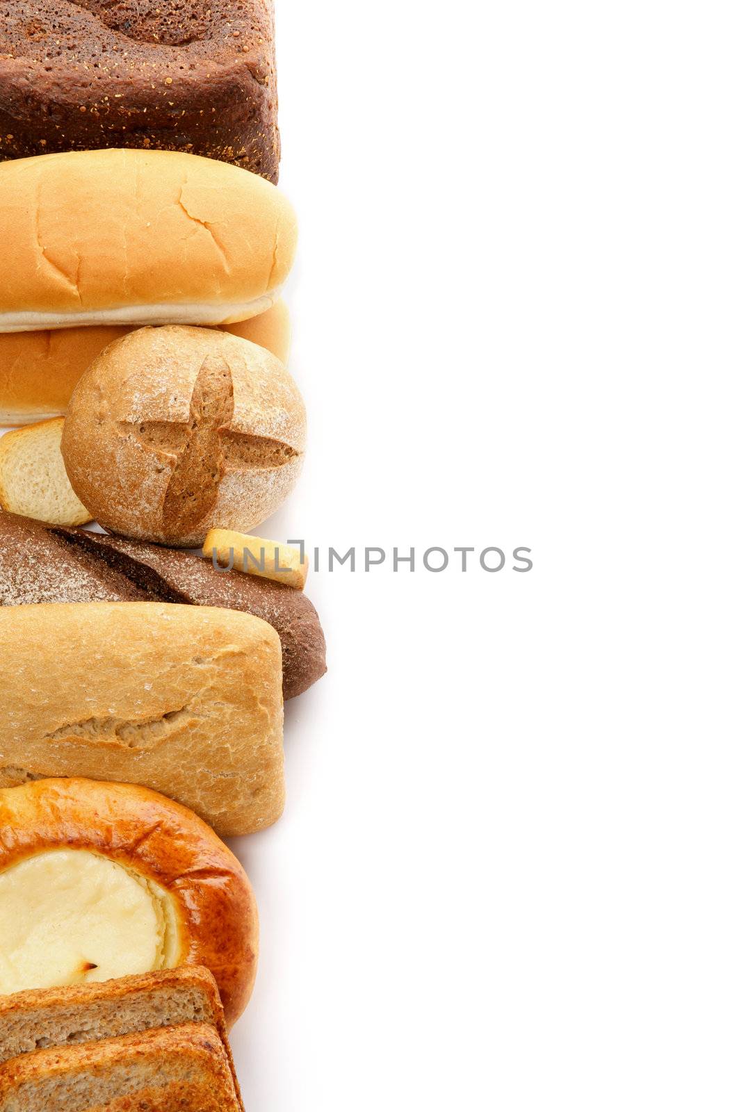Frame of Various Buns, Baguette, Rye and Whole Wheat Bread close up isolated on white background