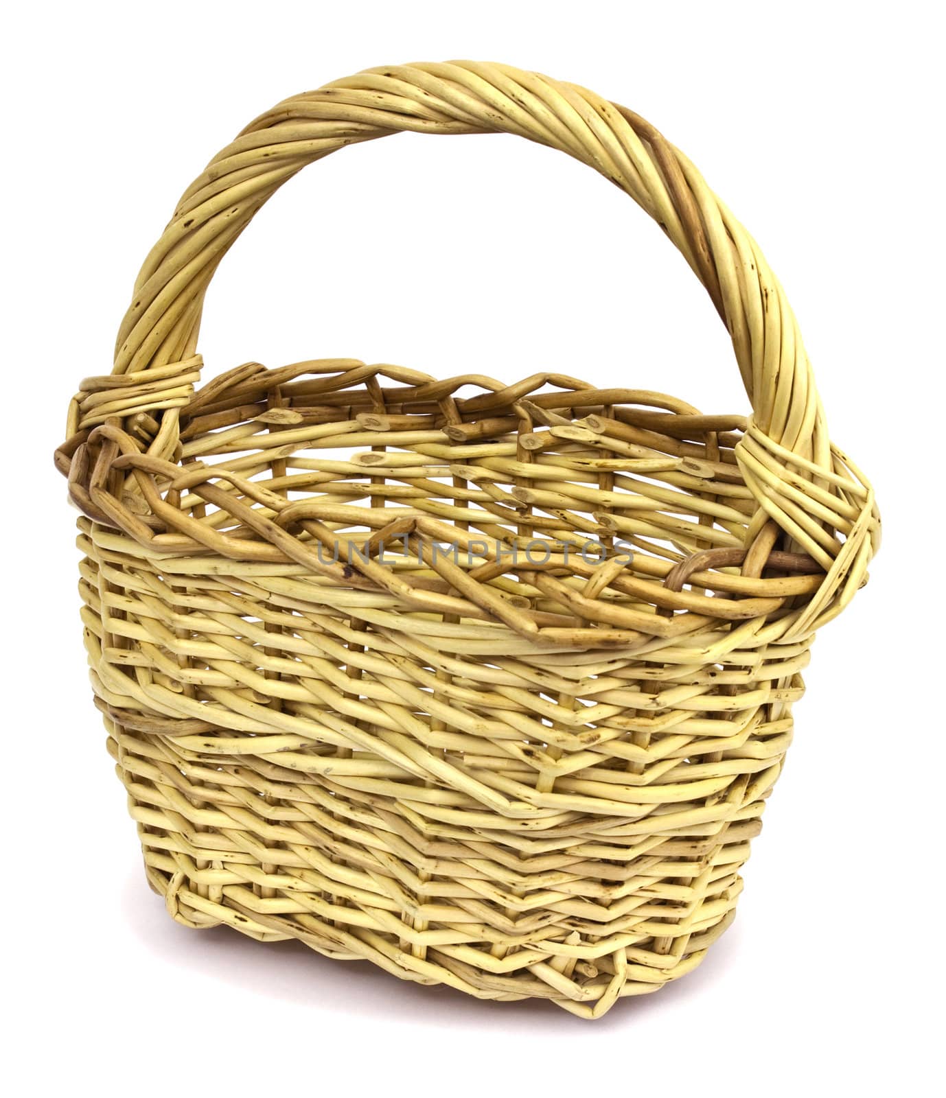 Basket in wattled from willow rods in white background