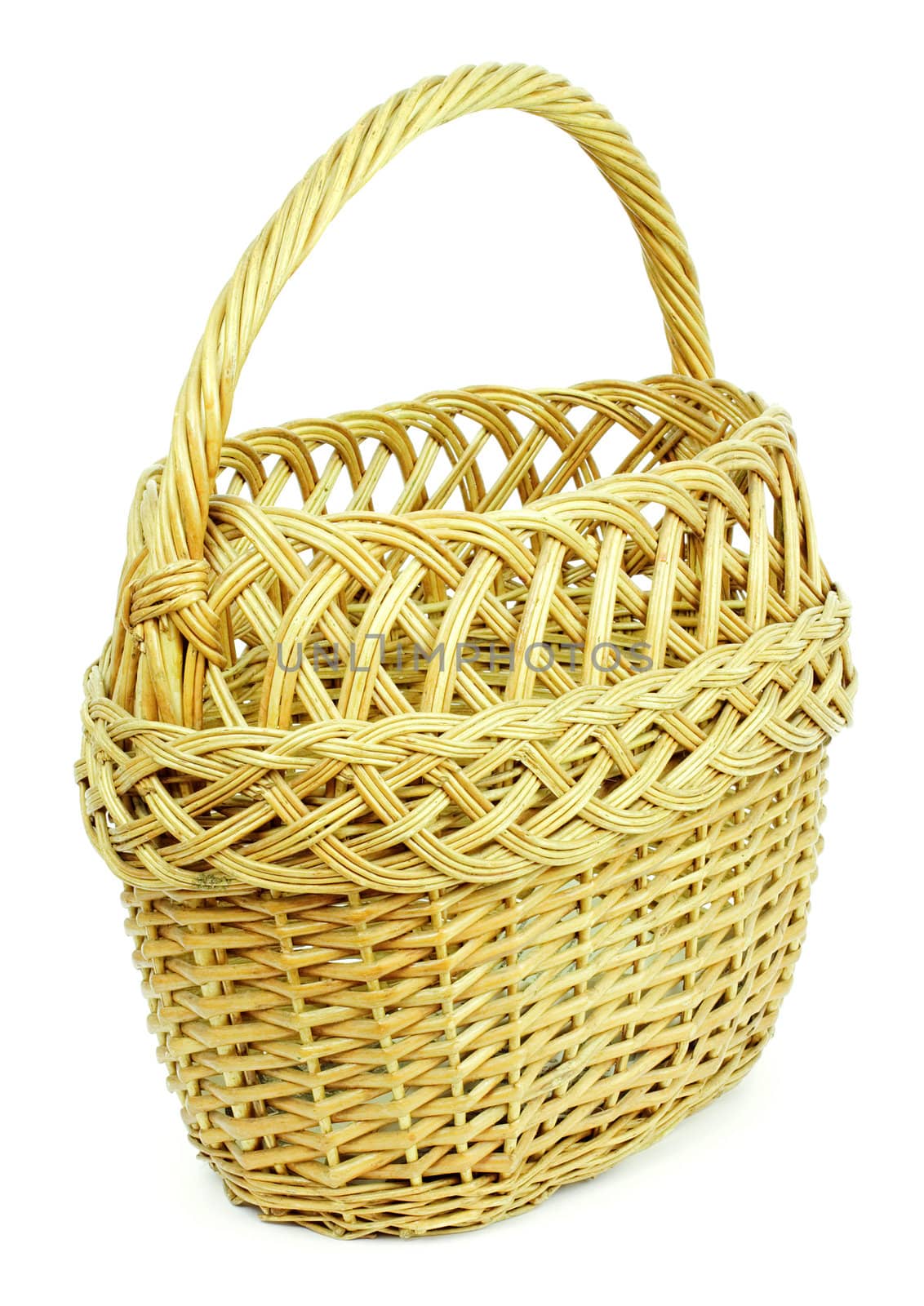 Basket in wattled from willow rods in white background