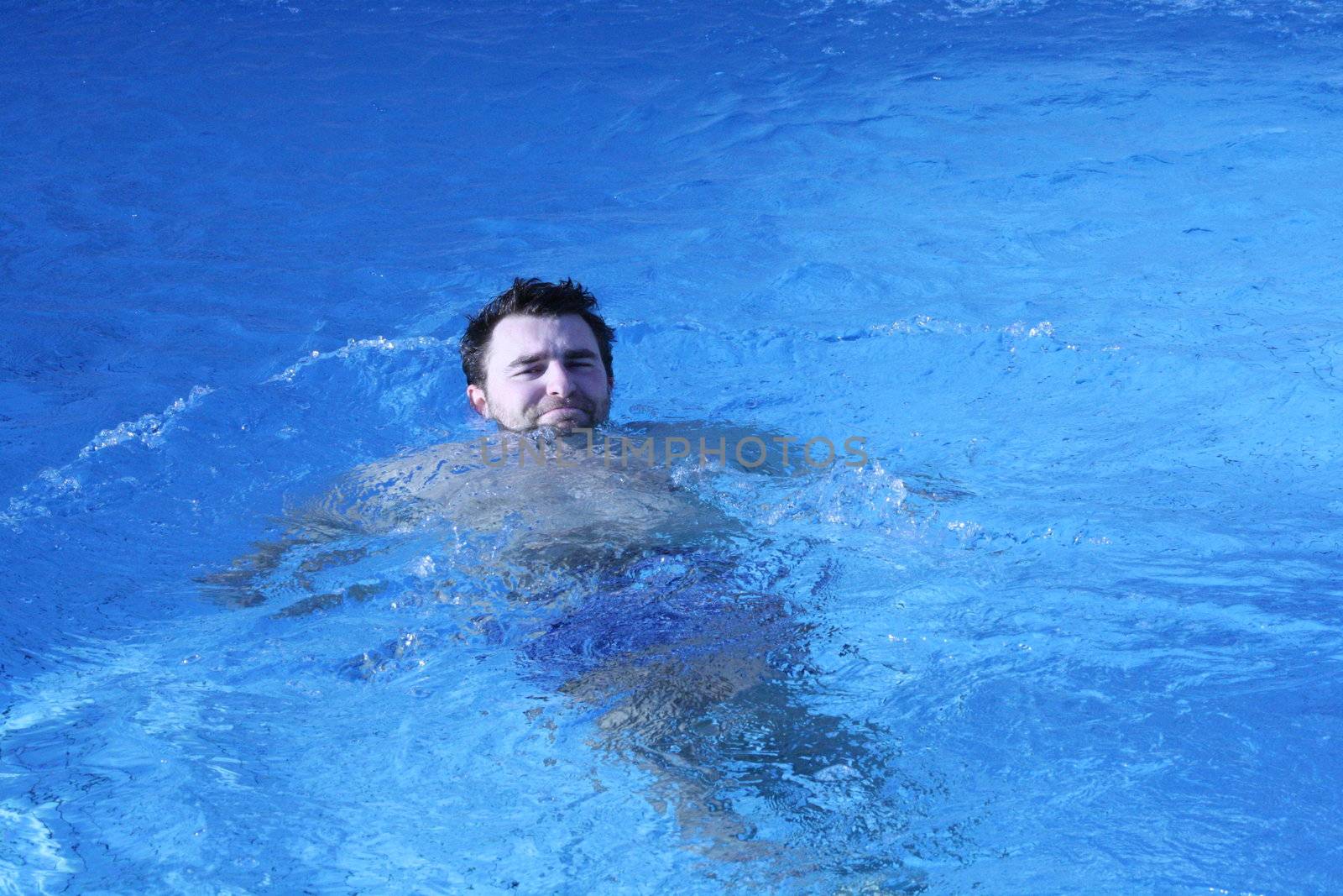 young attractive man relax in spa area