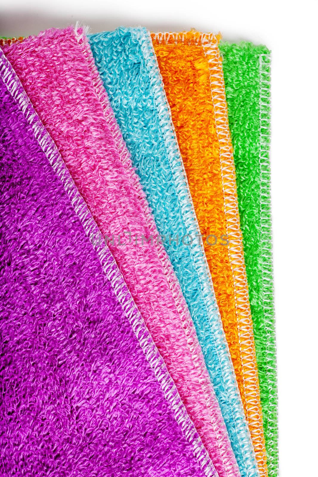 Closeup view of pile of colorful cleaning rags