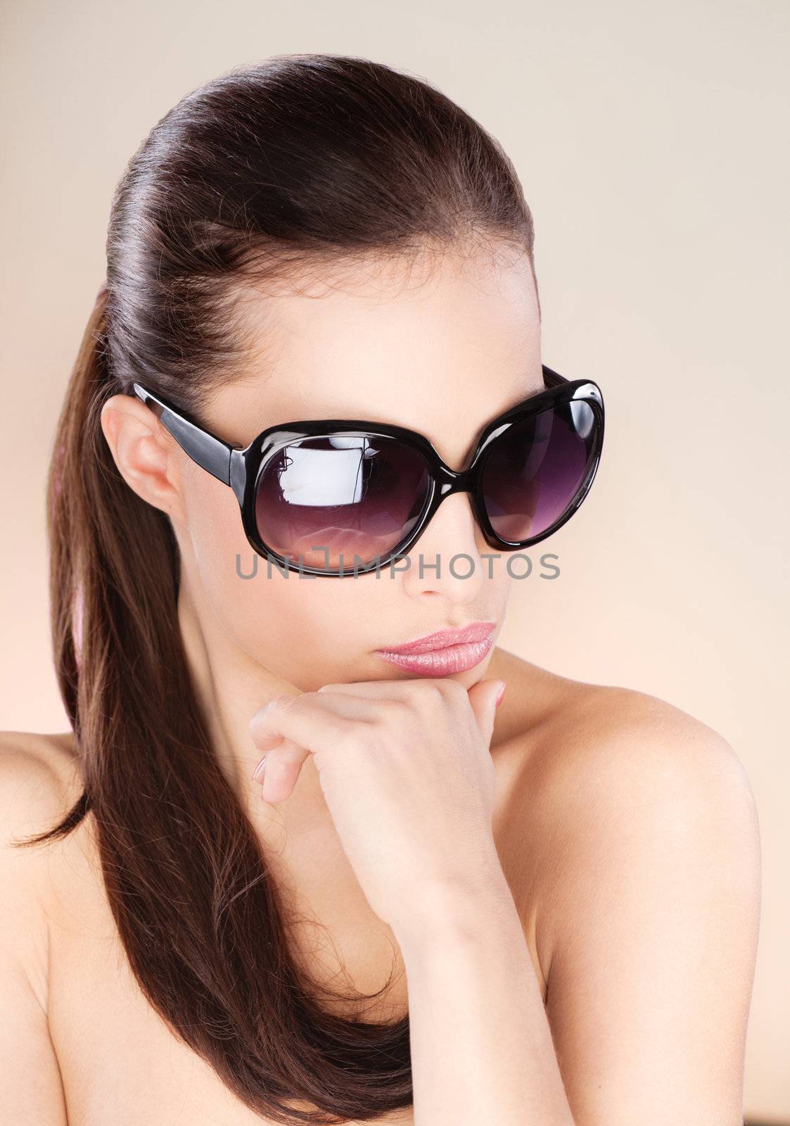 Pretty woman with big sun glasses