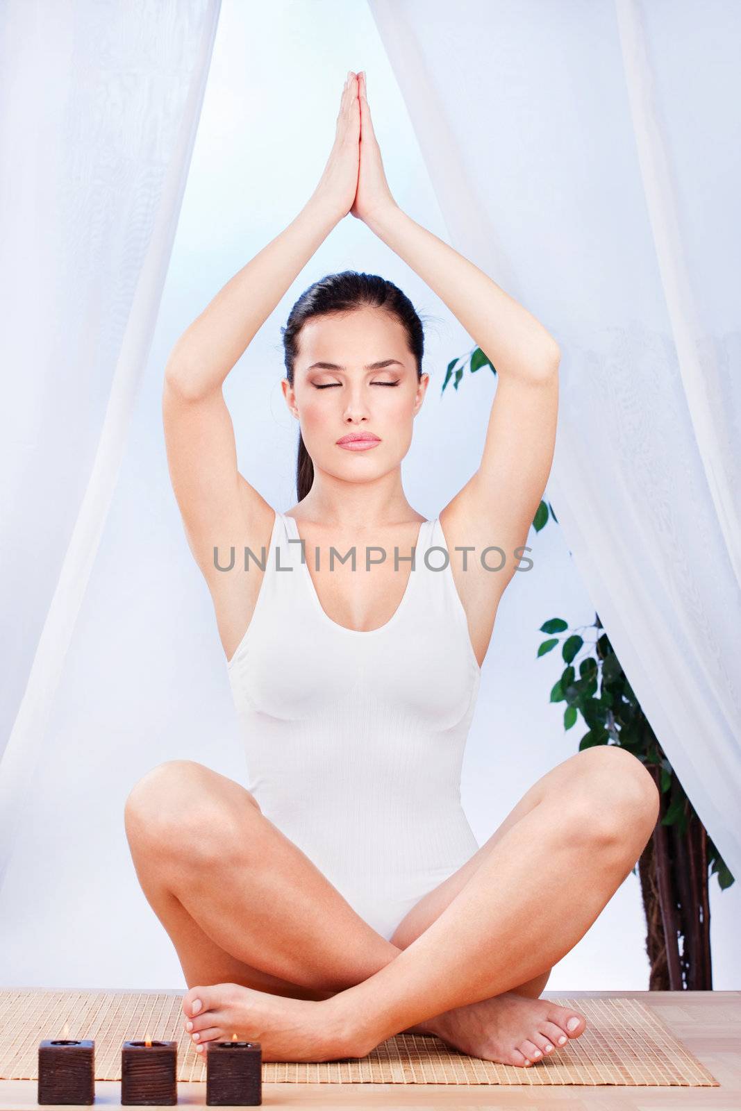 woman at yoga relaxation by imarin