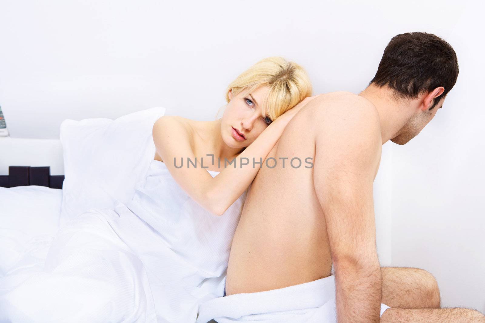 End of a young couple in bedroom, focus on female