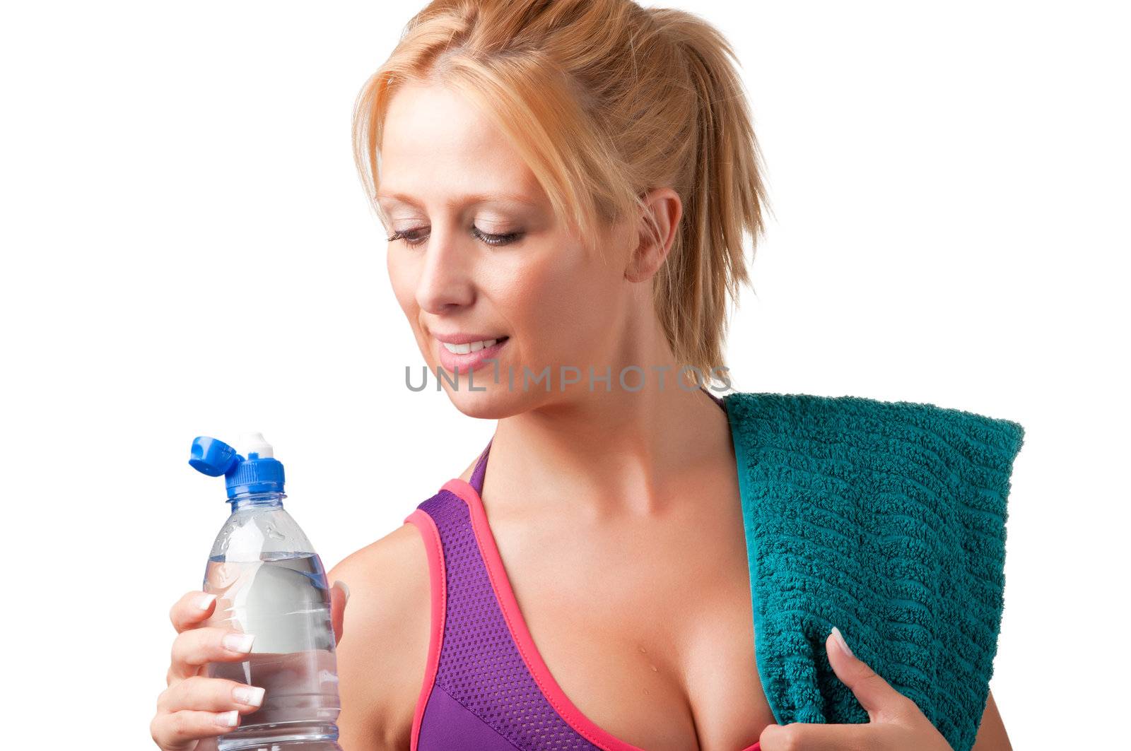 Woman about to drink water from a plastic bottle, isolated in white