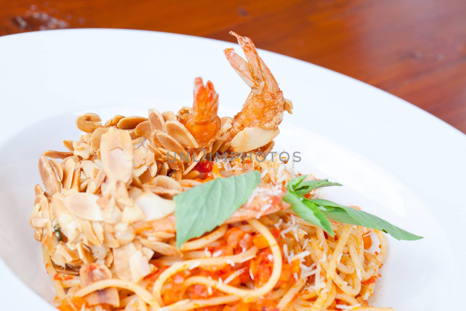 Spaghetti with Almond Shrimp meal cuisine (Selective Focus at shrimp)