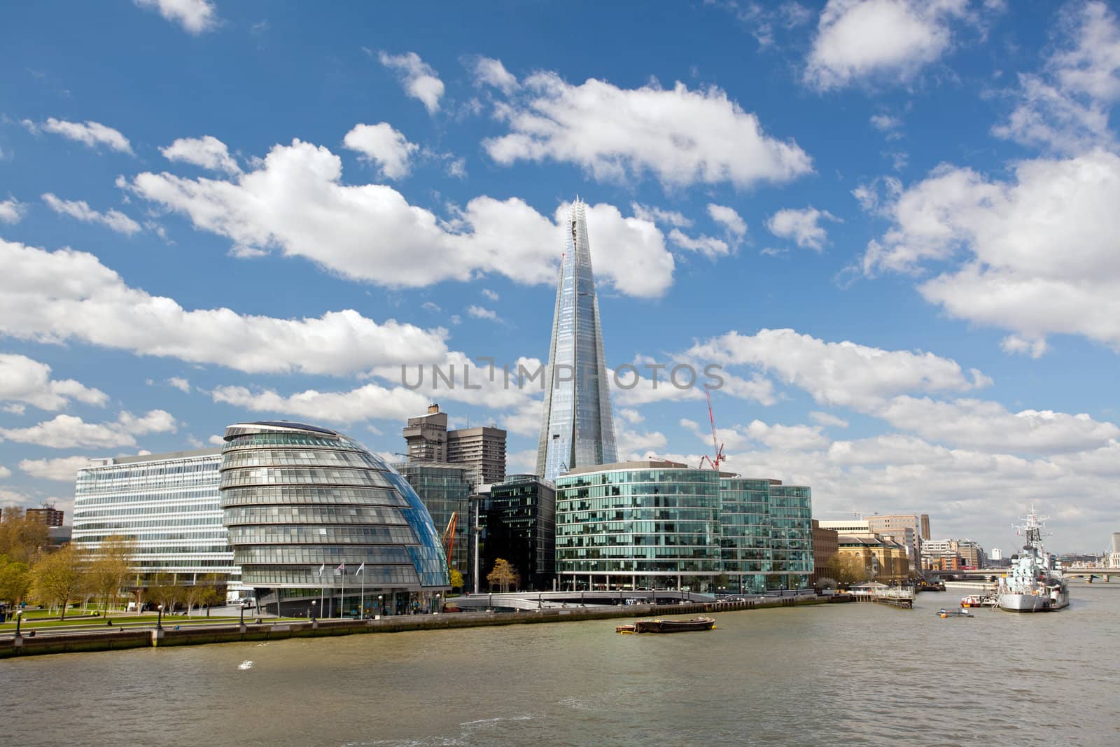 London City Hall Skylines along River Thames against blue sky, England UK