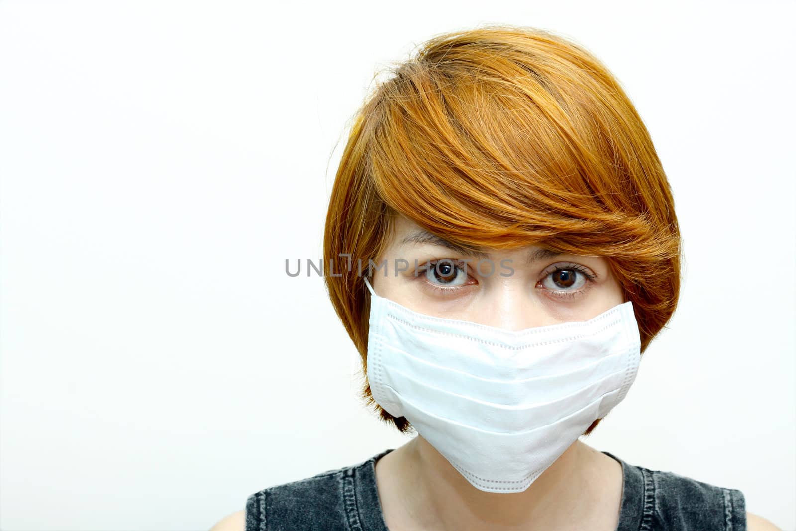 Image of woman wearing protective mask.