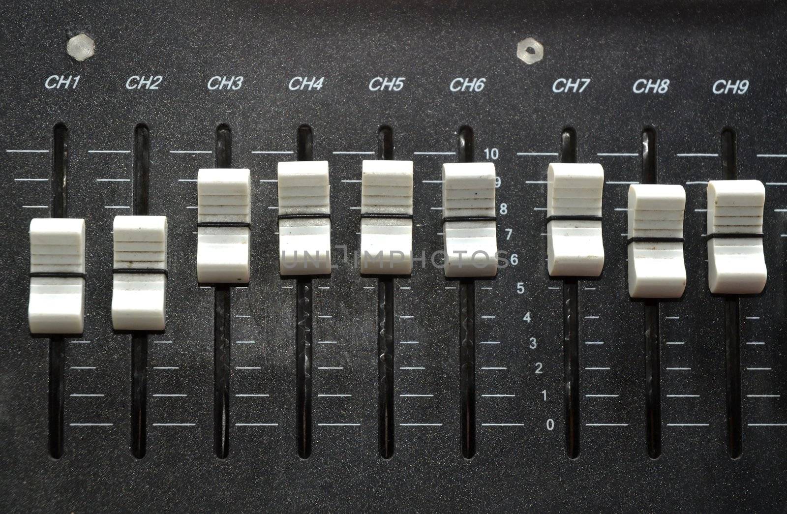 controls of an audio mixing device 