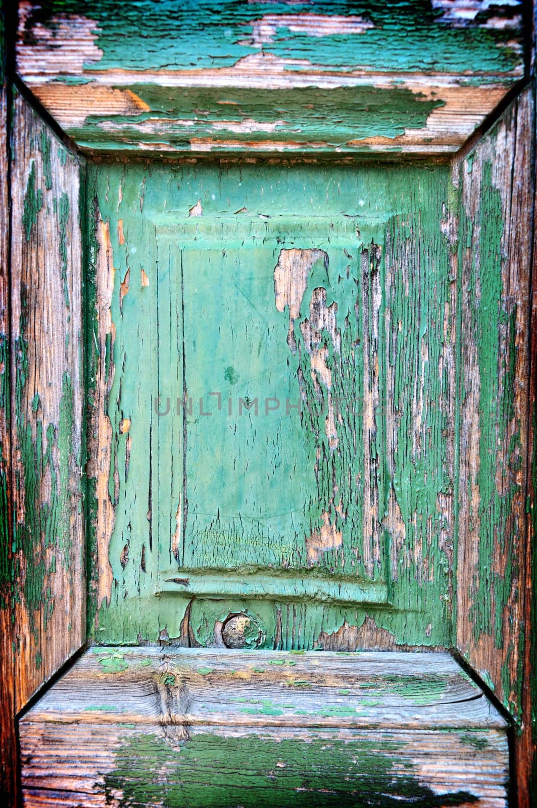 Grunge rural frame - fragment of old weathered door.