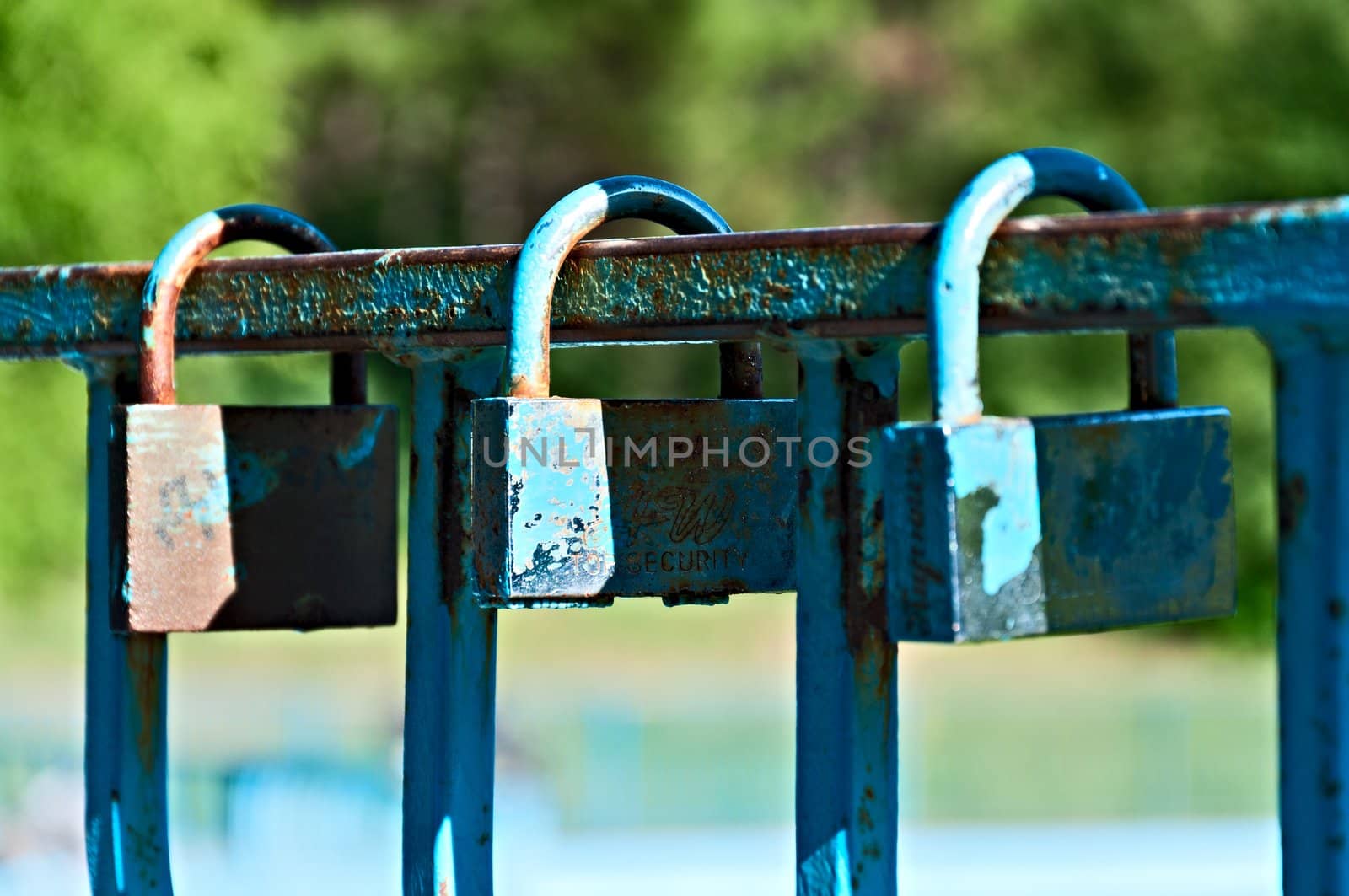 Three lock - love on the rails in a city park