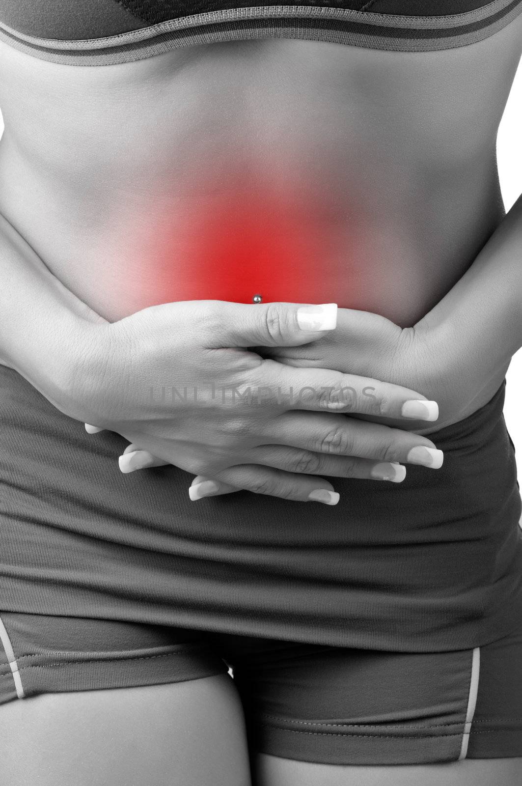 Woman suffering from stomach pain, isolated in white. Black and white with a red circle around the painful area.