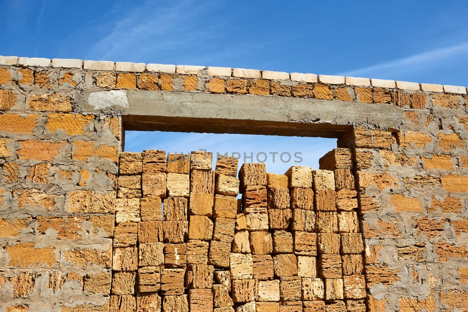 Construction of the house with a hollow limestone blocks