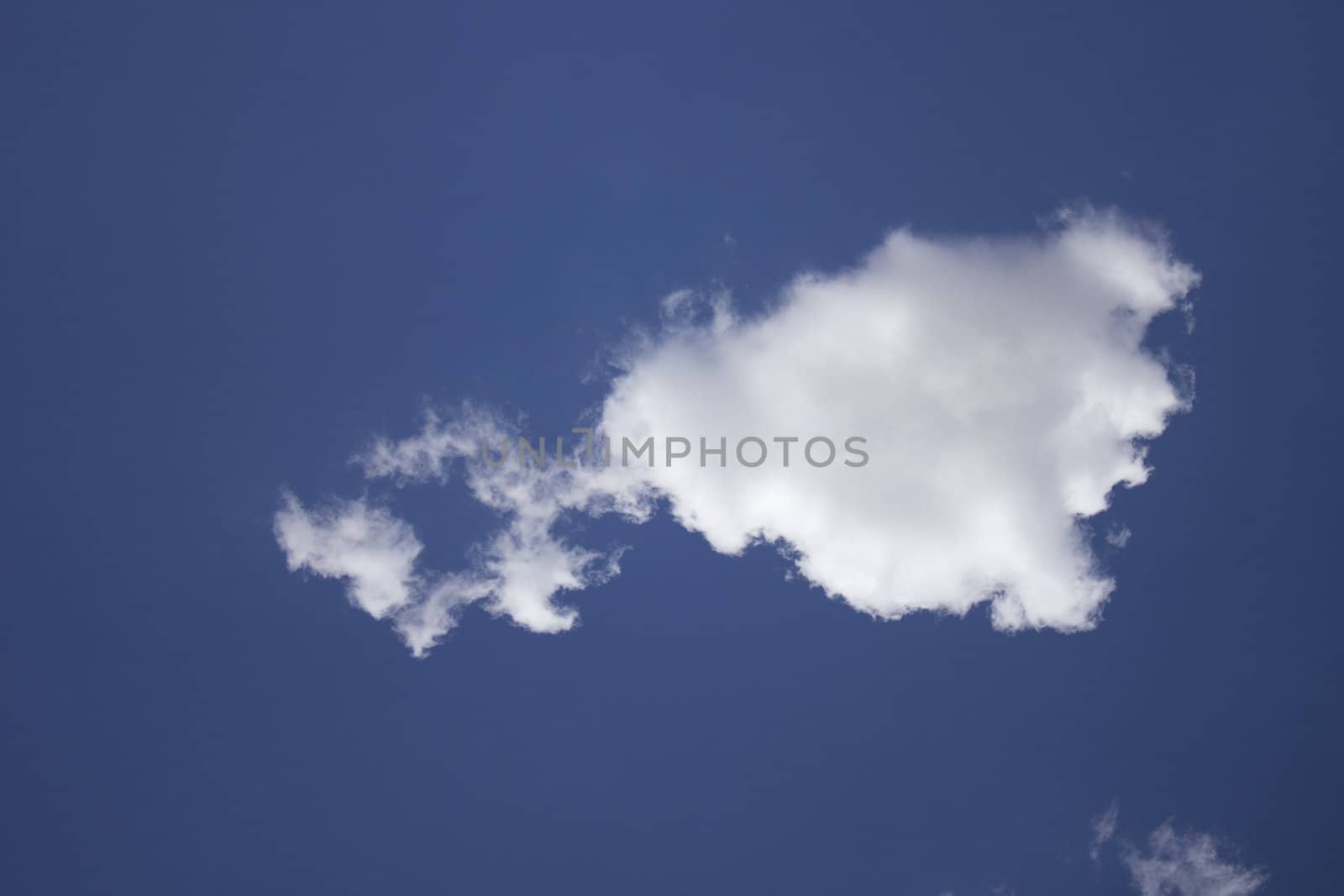 Dramatic Cloudy Sky with a deep blue background.