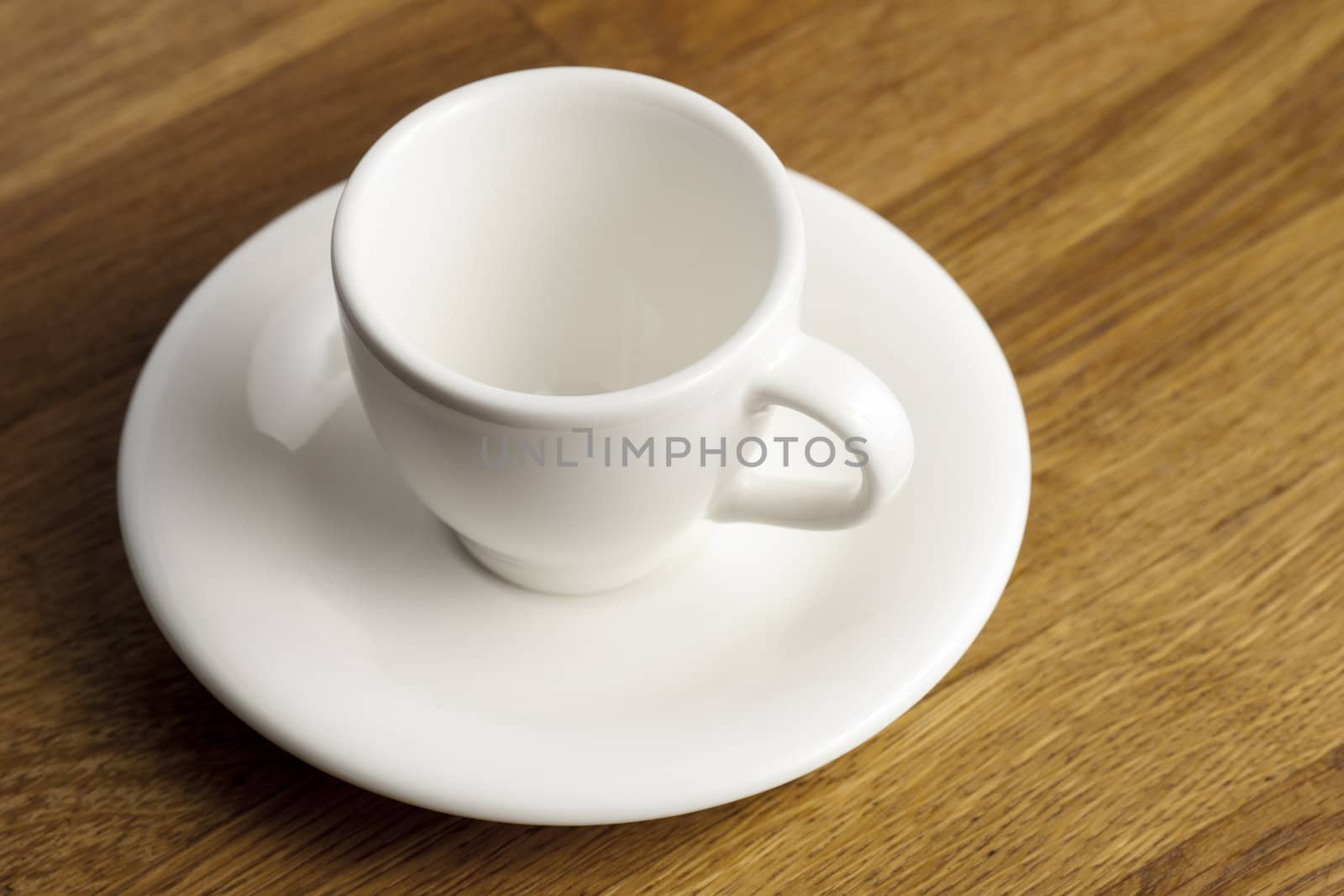 White porcelain coffee  cup on the table.