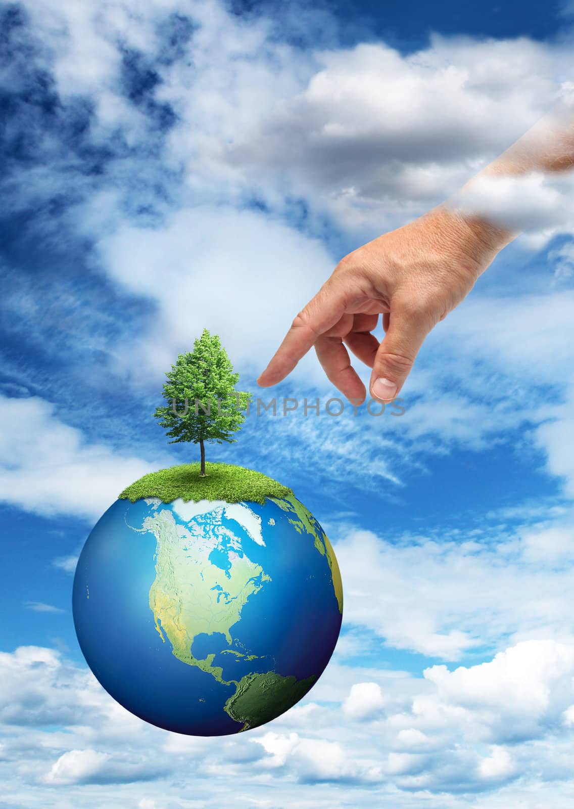 Male hand reaching to touch green tree on planet Earth
