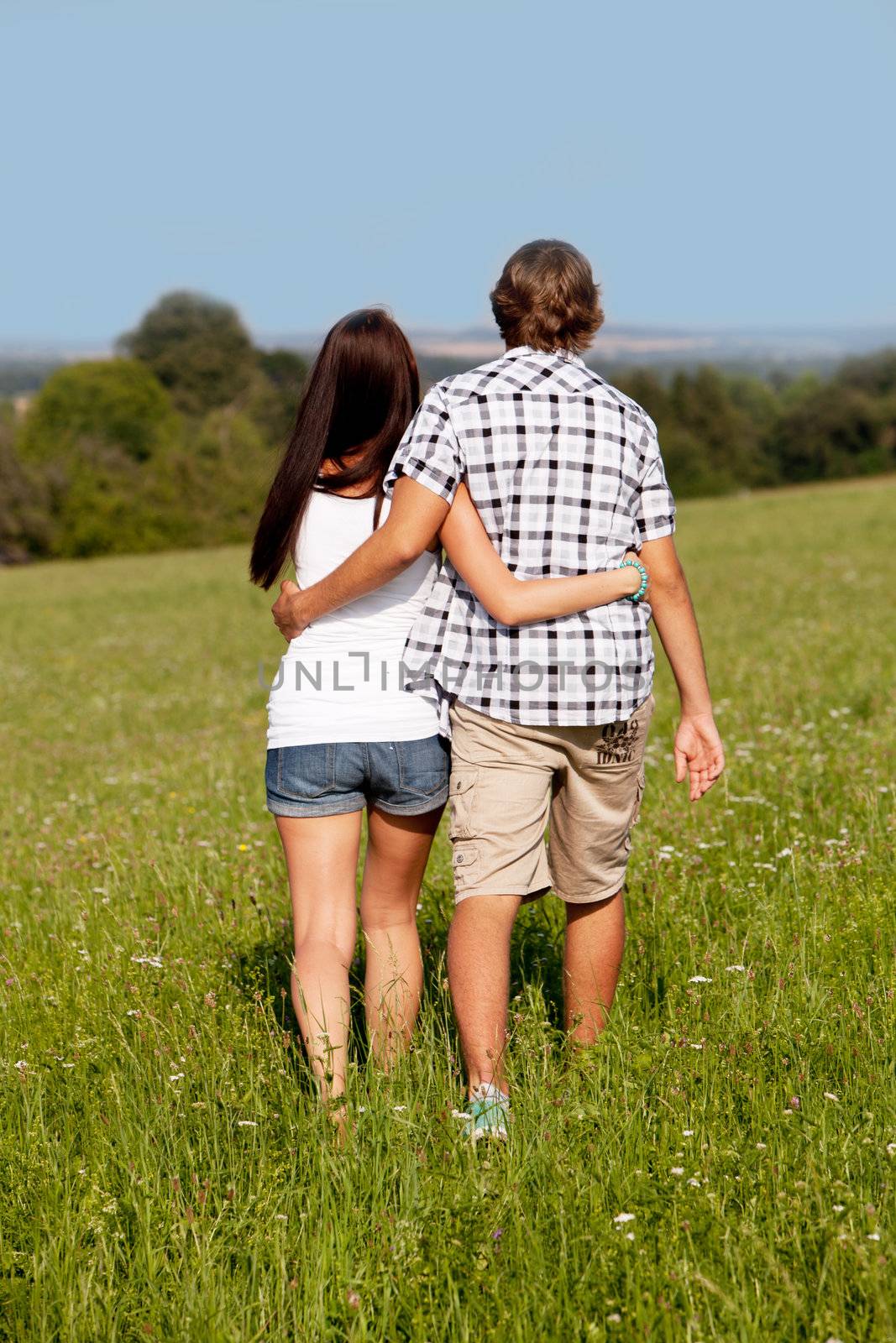 young love couple smiling outdoor in summer having fun