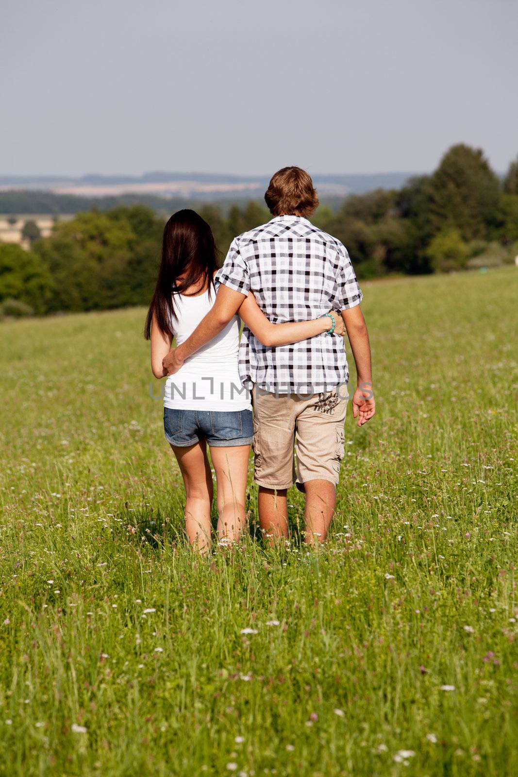 young love couple smiling outdoor in summer having fun