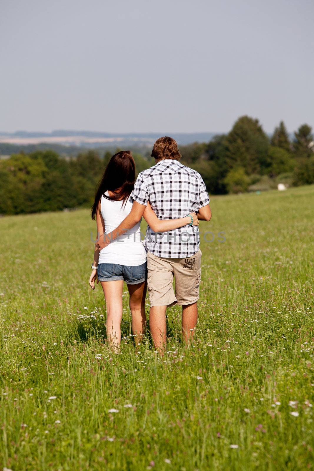 young love couple smiling outdoor in summer  by juniart